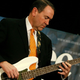 Image for article titled So, here's Mike Huckabee playing bass with a member of Korn